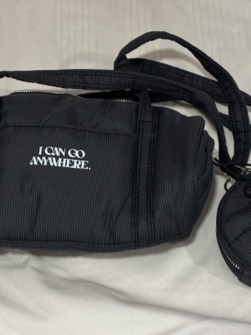 i can go anywhere quilted mini duffel bag with detachable coin pouch
